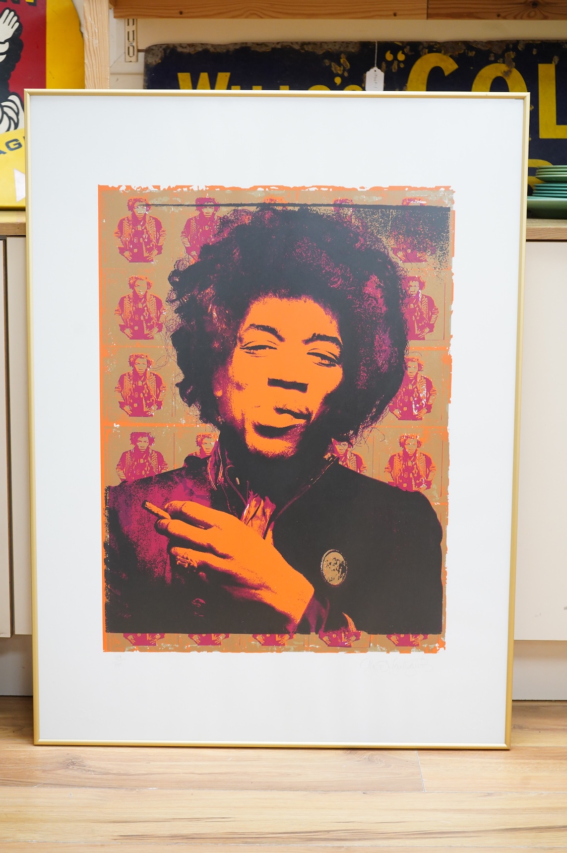 Jimi Hendrix interest; a framed silkscreen print by Gered Mankowitz (b.1946), of Jimi Hendrix, titled ‘Purple Haze’, signed by Mankowitz in pencil and limited edition 139/500, blind stamped, 101 x 75cm